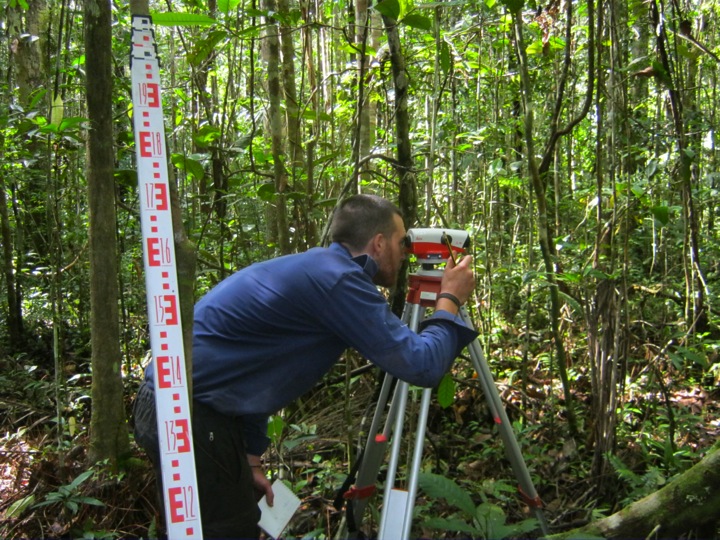 Surveying along a transect across the peatland.